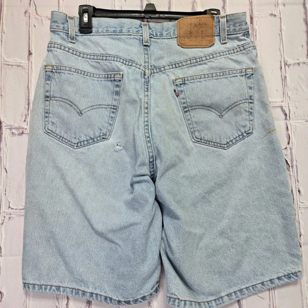Vintage Levis 560 Loose Fit Denim Shorts Mens 34 Light Wash Distressed 90s Baggy